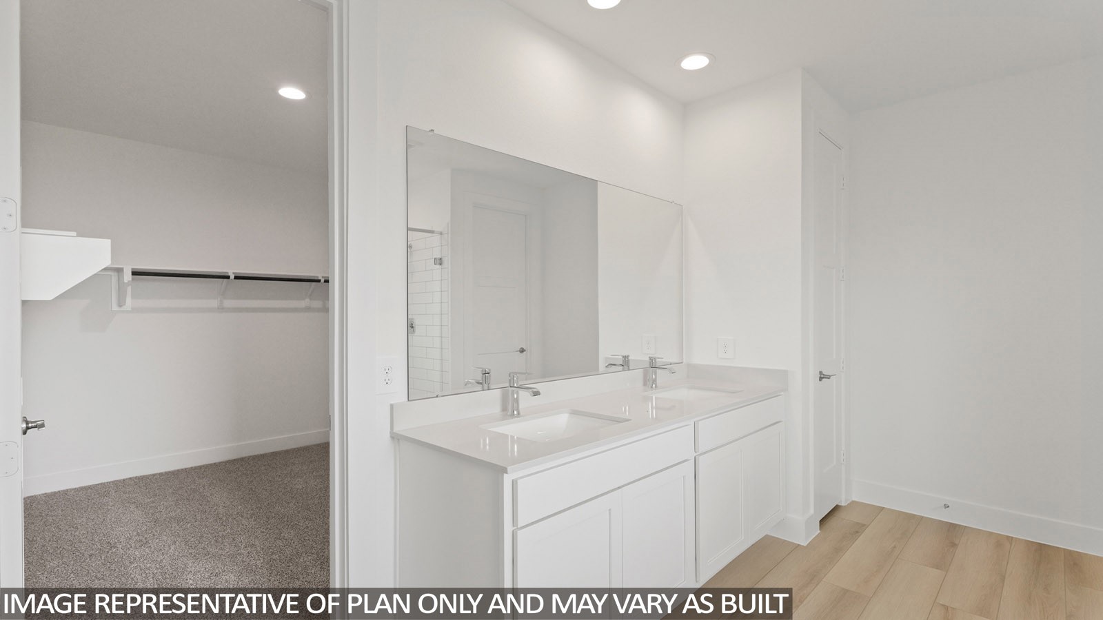 4613 Vernal Loop Conroe, TX 77303 - Photo 13 of 35 a bathroom with a sink and a mirror