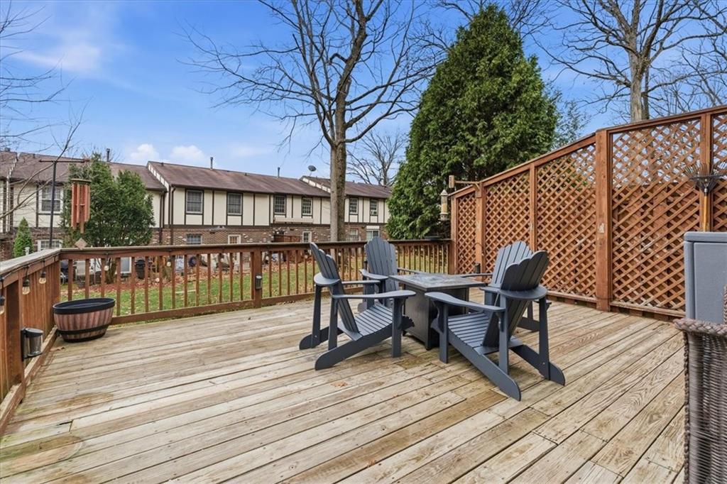 2356 Big Rock Road Allison Park, PA 15101 - Photo 23 of 31 a view of a deck with table and chairs and wooden floor