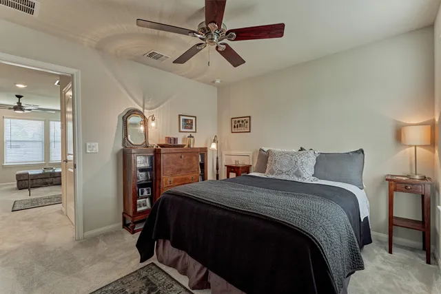 a view of a backyard with pathway