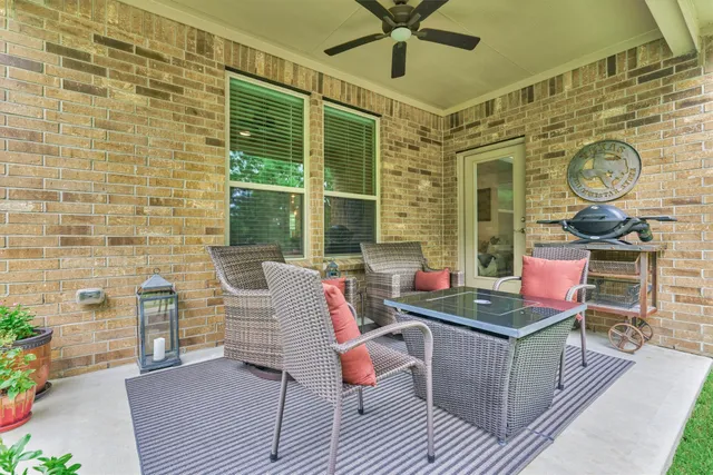 view of house with backyard