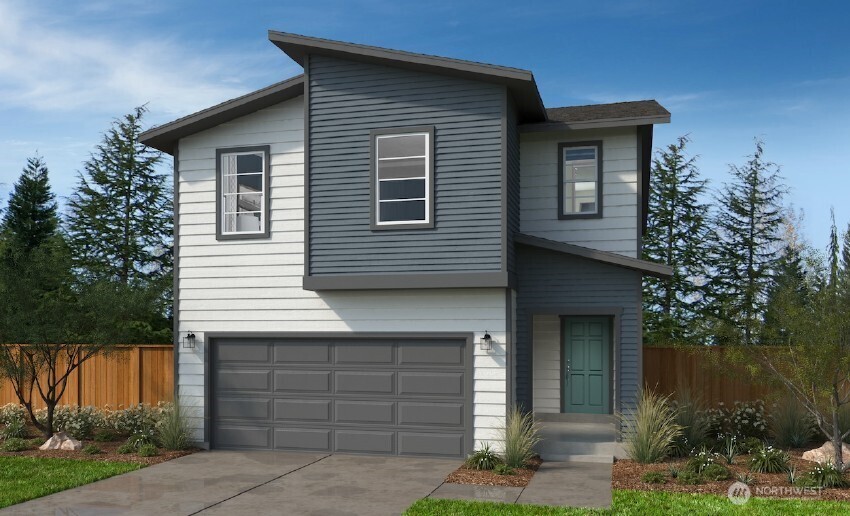 a front view of a house with a garage