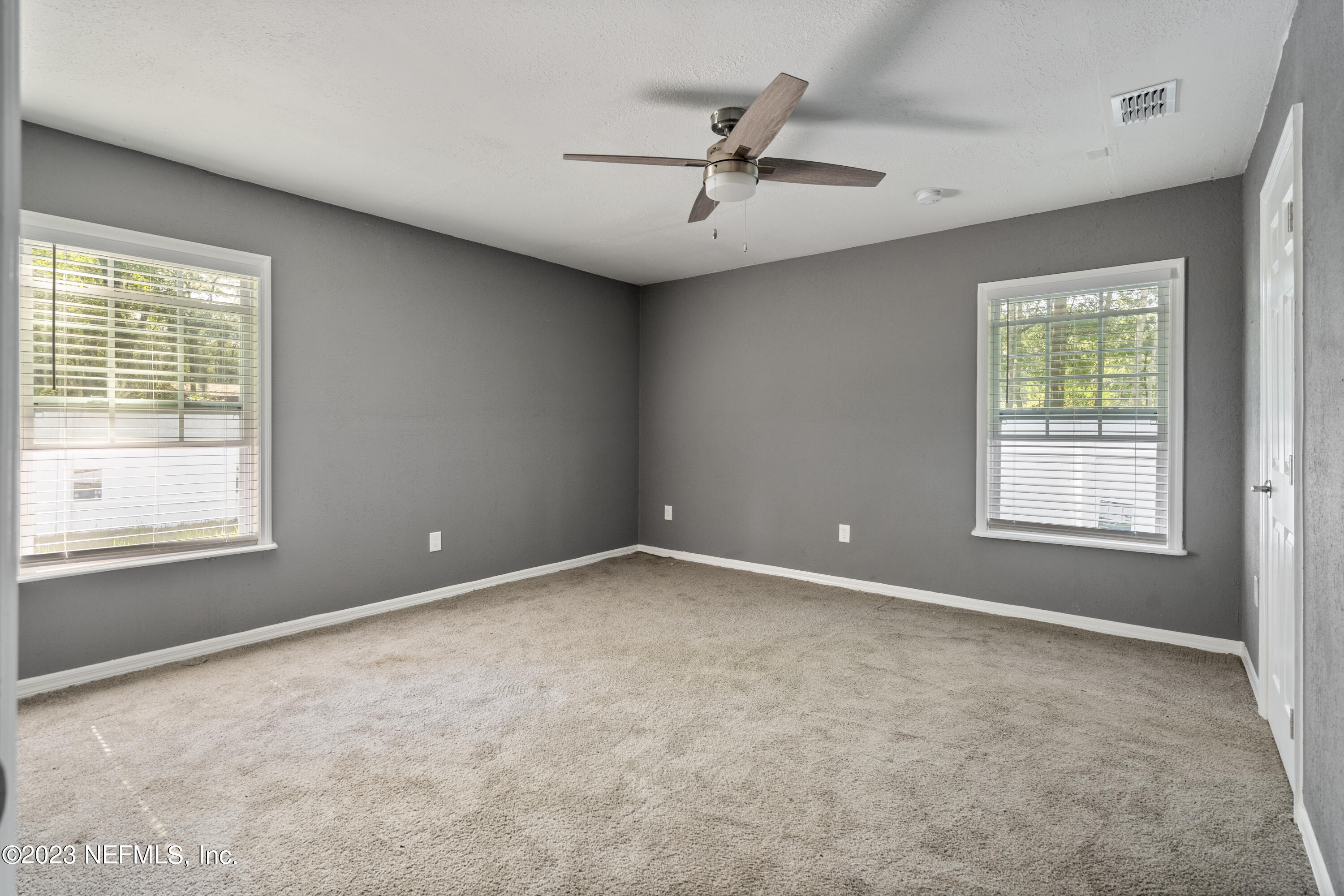 221 Monterey Boulevard Baldwin, FL 32234 - Photo 11 of 18 a view of an empty room with a window