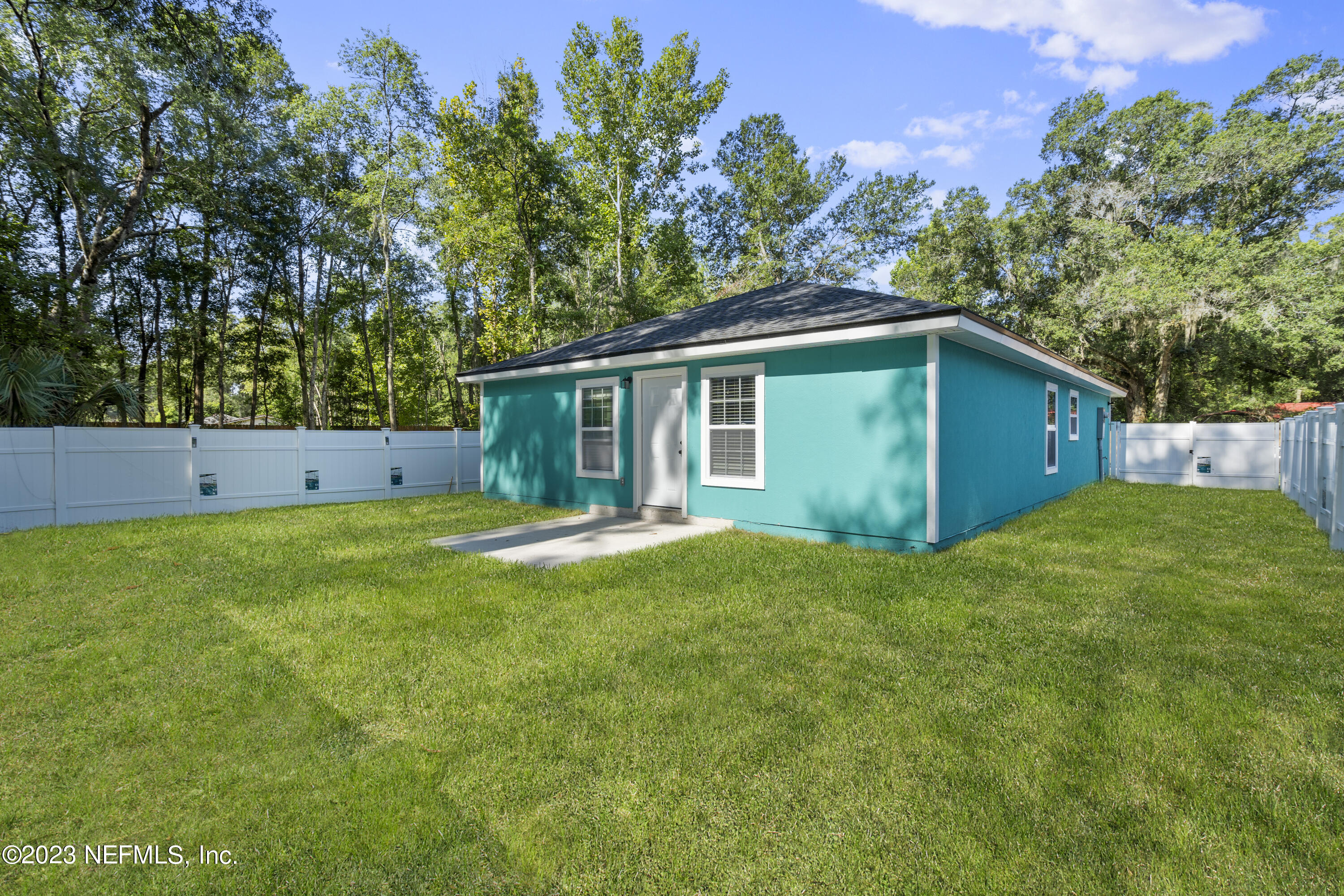 221 Monterey Boulevard Baldwin, FL 32234 - Photo 15 of 18 a view of an house with backyard space and garden