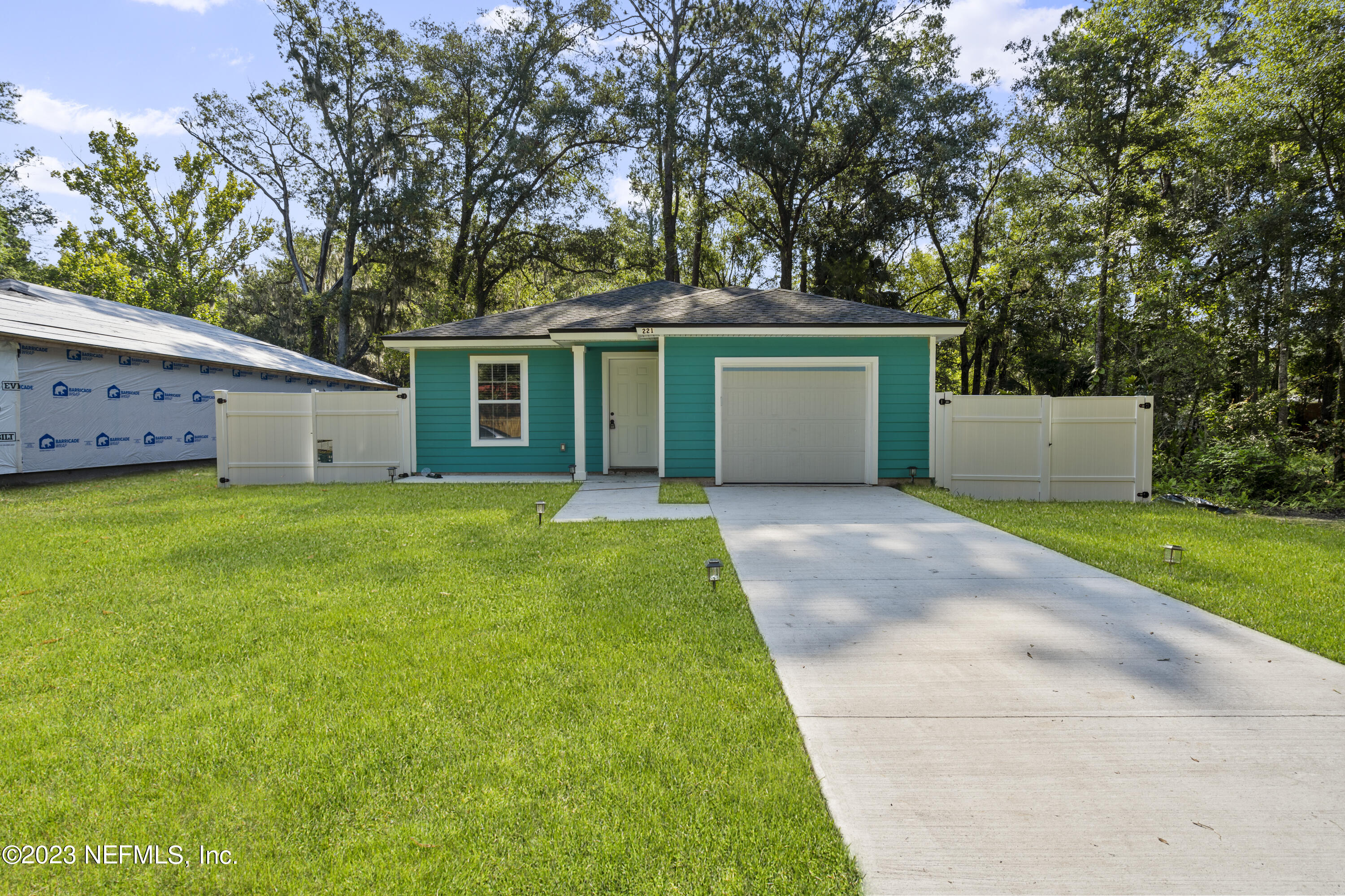 221 Monterey Boulevard Baldwin, FL 32234 - Photo 3 of 18 a view of a house with a yard and large tree
