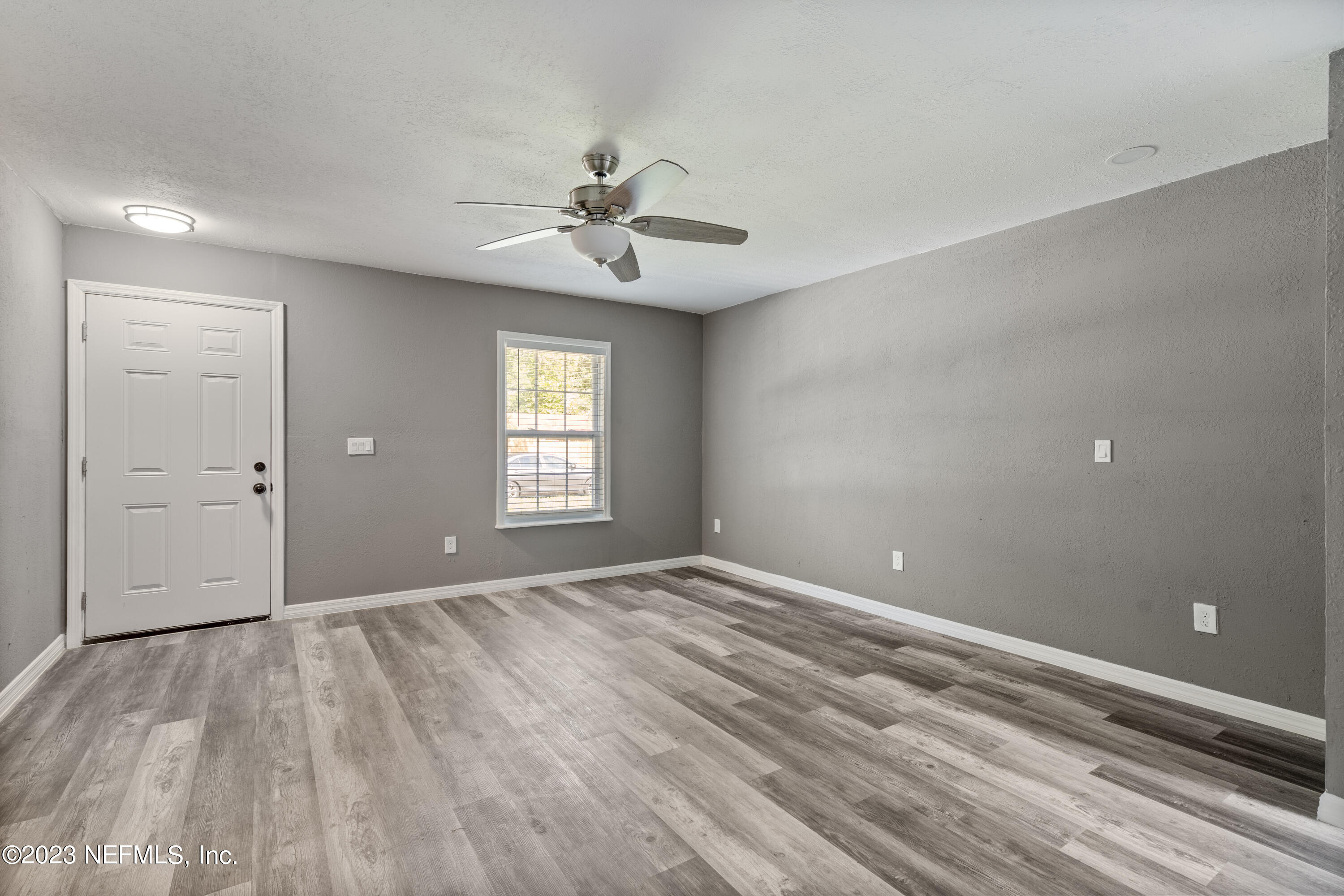 221 Monterey Boulevard Baldwin, FL 32234 - Photo 5 of 18 a view of an empty room with a window