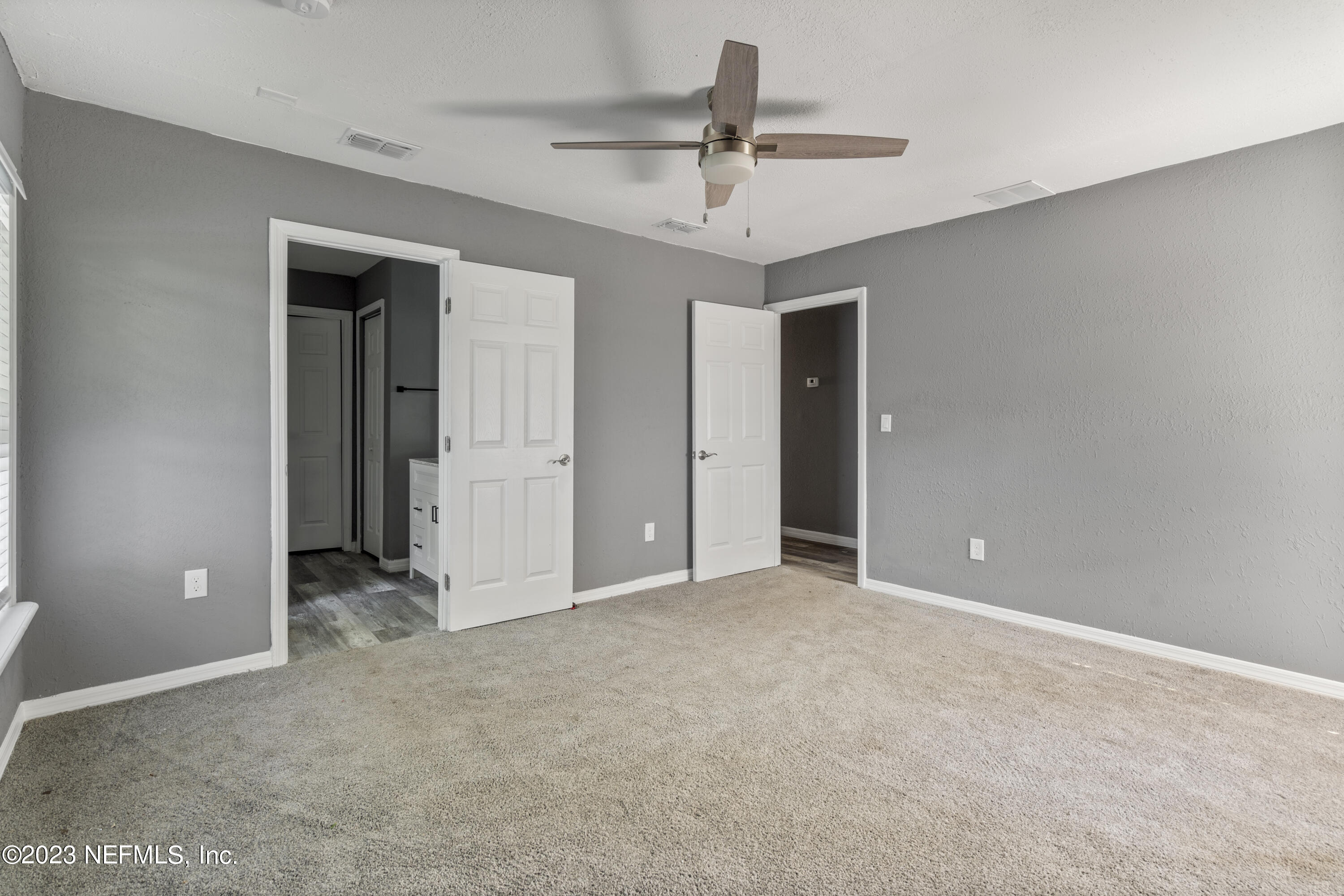 221 Monterey Boulevard Baldwin, FL 32234 - Photo 8 of 18 a view of empty room with ceiling fan