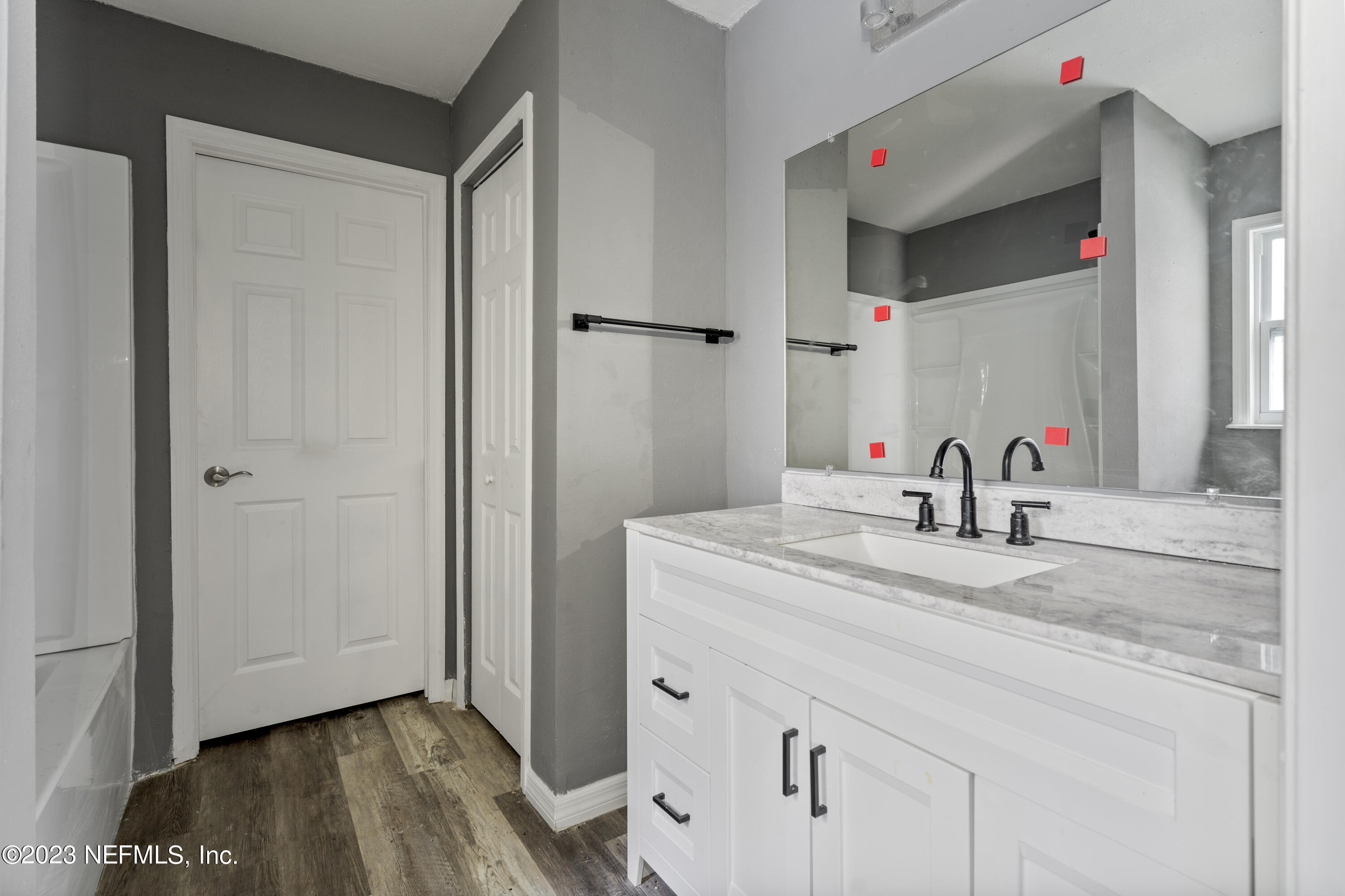 221 Monterey Boulevard Baldwin, FL 32234 - Photo 10 of 18 a bathroom with a sink and a mirror