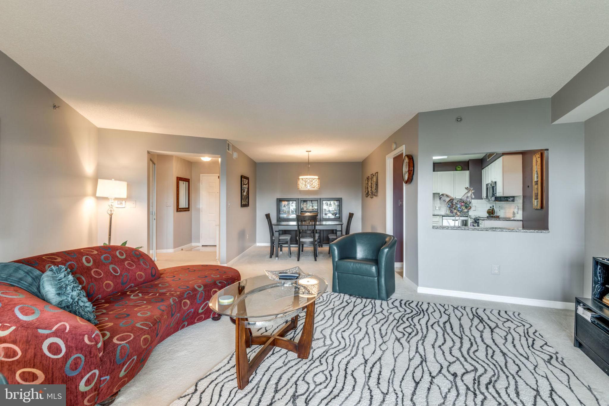 19385 Cypress Ridge Terrace, Unit 721 Leesburg, VA 20176 - Photo 11 of 26 Open living/dining area is great for entertaining