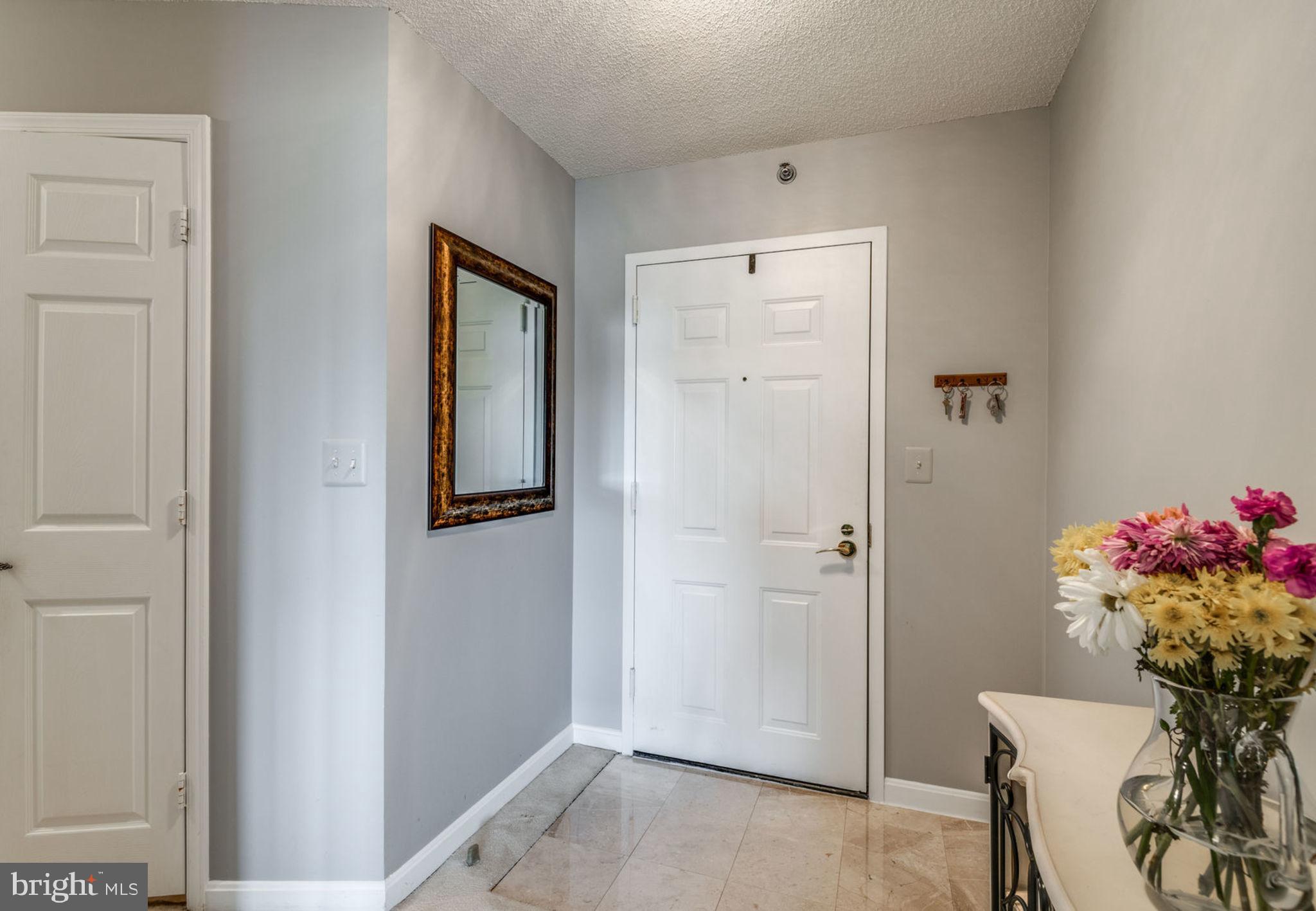 19385 Cypress Ridge Terrace, Unit 721 Leesburg, VA 20176 - Photo 7 of 26 Welcome guests to your new home