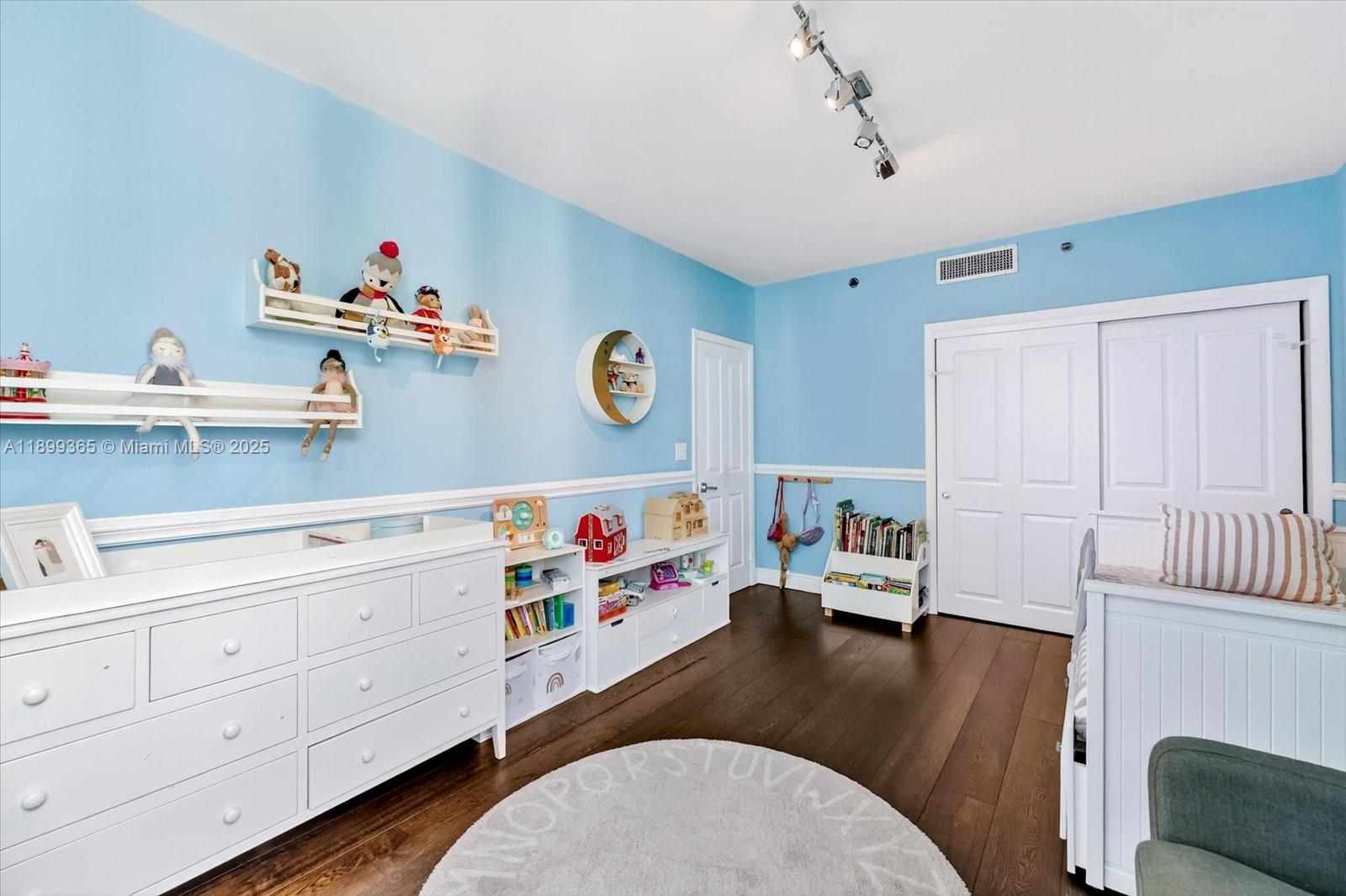 2127 Brickell Avenue, Unit 2005 Miami, FL 33129 - Photo 22 of 53 a baby room with toys