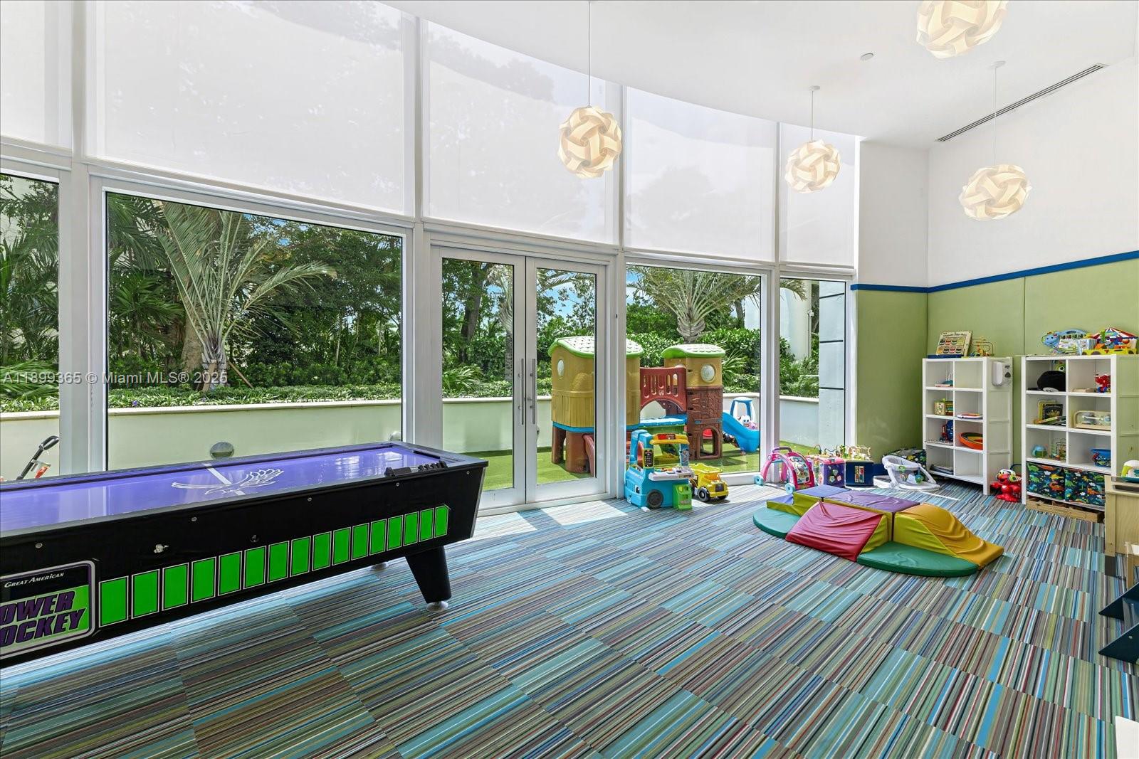 2127 Brickell Avenue, Unit 2005 Miami, FL 33129 - Photo 44 of 53 a room with musical instrument pool table and chairs