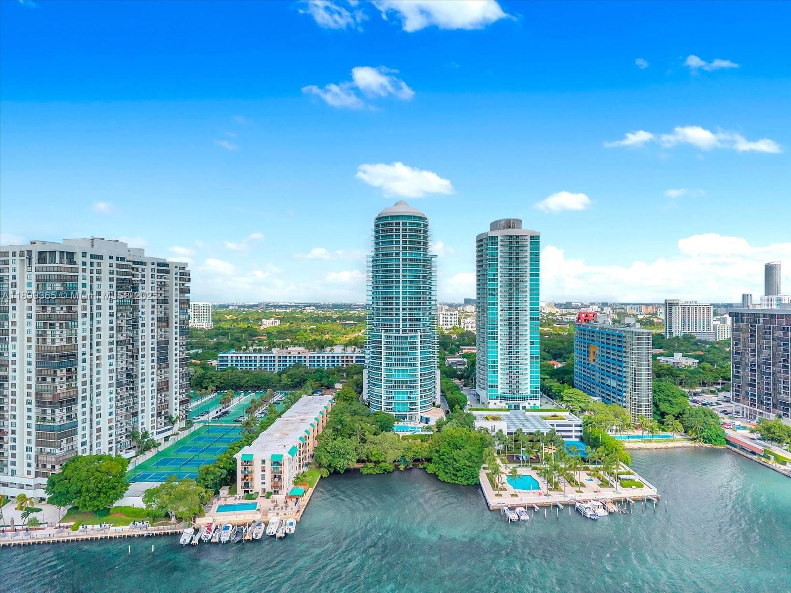 2127 Brickell Avenue, Unit 2005 Miami, FL 33129 - Photo 48 of 53 a multi story building with swimming pool in front of it