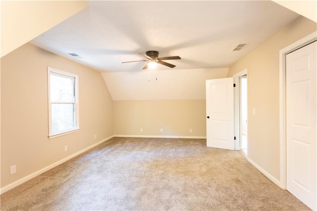 1149 Criswell Road Southeast Monroe, GA 30655 - Photo 34 of 60 a view of an empty room with a window