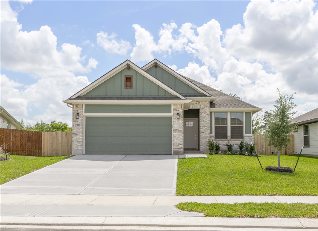 2776 Messenger Way Bryan, TX 77803 - Photo 1 of 16 a front view of a house with a yard and garage