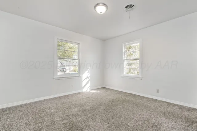 a wooden house with a outdoor space