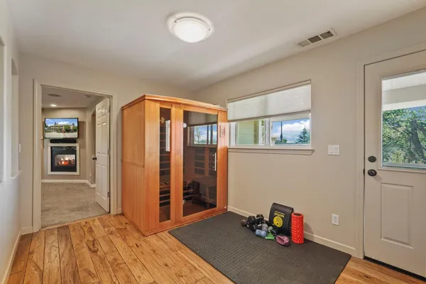 a view of entryway with wooden floor