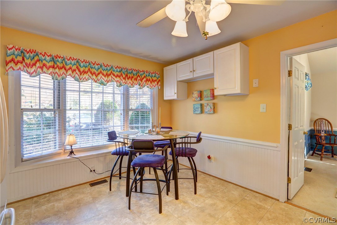 13601 Queensgate Road Midlothian, VA 23114 - Photo 20 of 39 a view of a dining room with furniture window and outside view