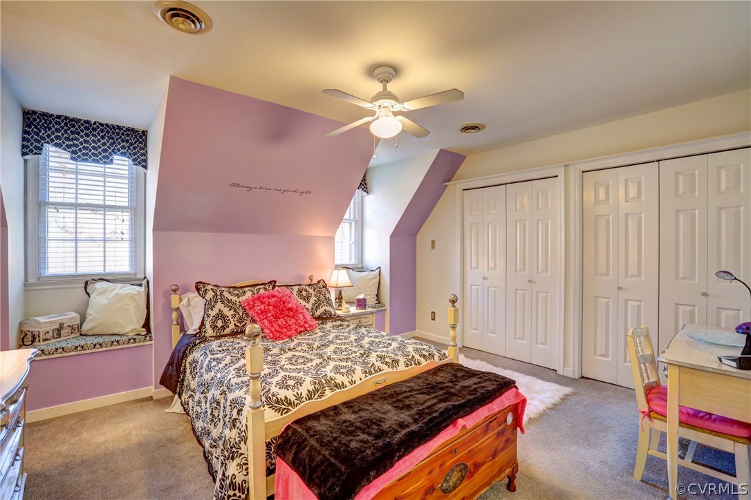 13601 Queensgate Road Midlothian, VA 23114 - Photo 27 of 39 a bedroom with a bed and a chandelier