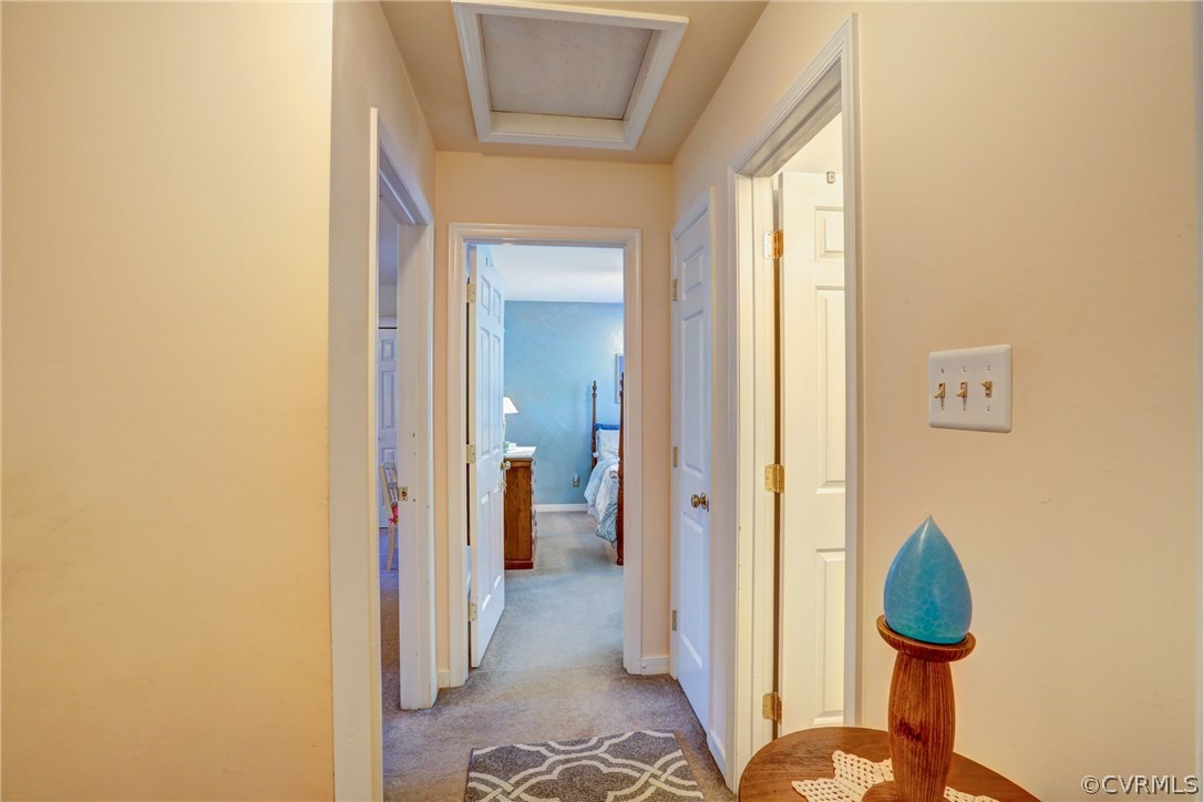 13601 Queensgate Road Midlothian, VA 23114 - Photo 32 of 39 a view of a hallway with bathroom and glass door
