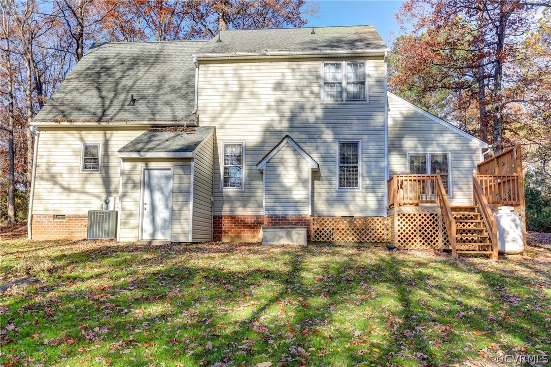 13601 Queensgate Road Midlothian, VA 23114 - Photo 36 of 39 a front view of a house with a yard