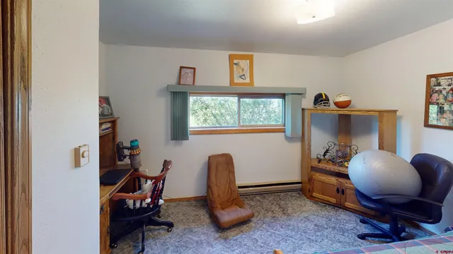 a room with furniture and a window