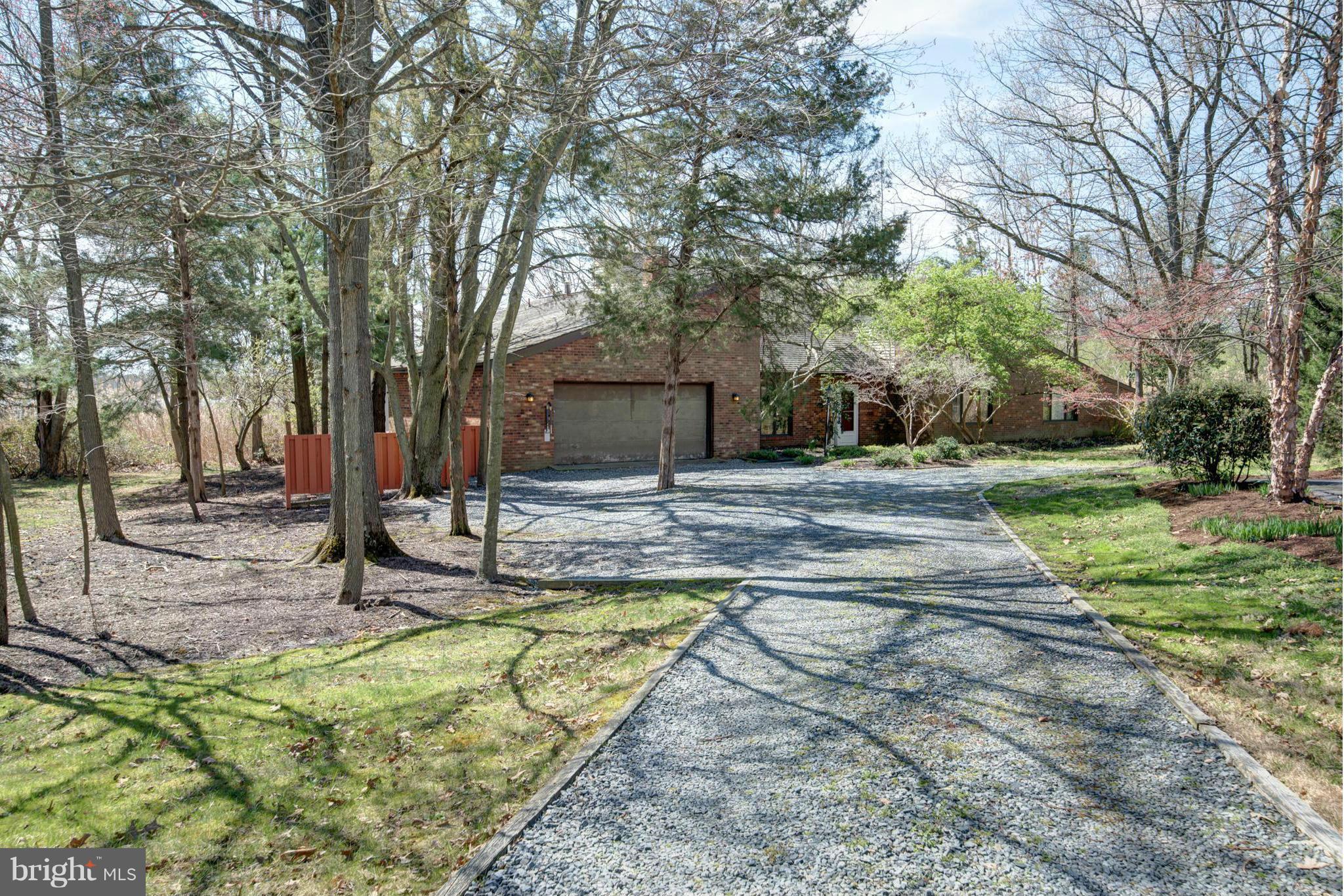 229 Birch Run Road Chestertown, MD 21620 - Photo 1 of 22 a view of a backyard with a small cabin