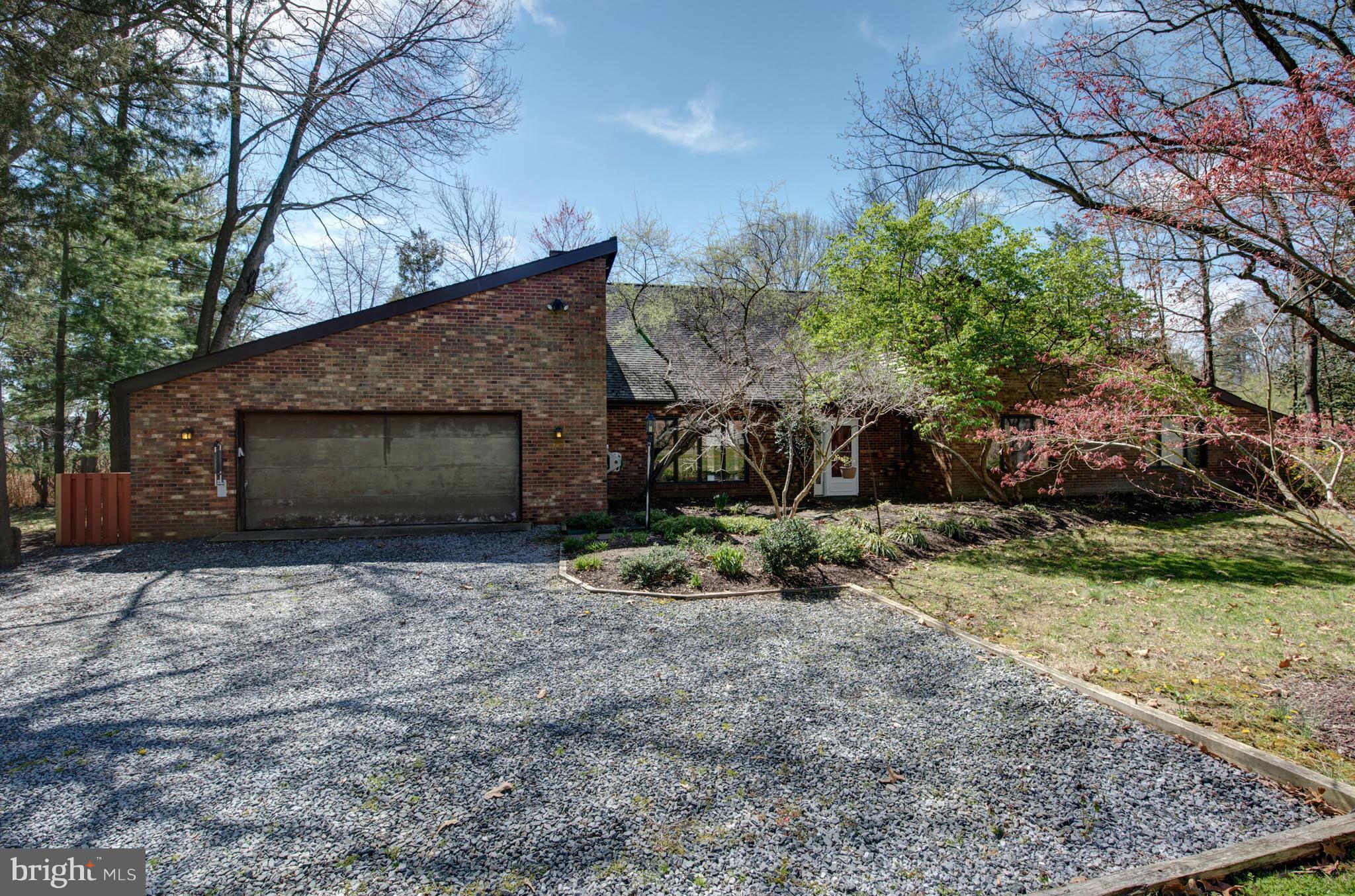 229 Birch Run Road Chestertown, MD 21620 - Photo 2 of 22 a backyard of a house with plants and outdoor seating