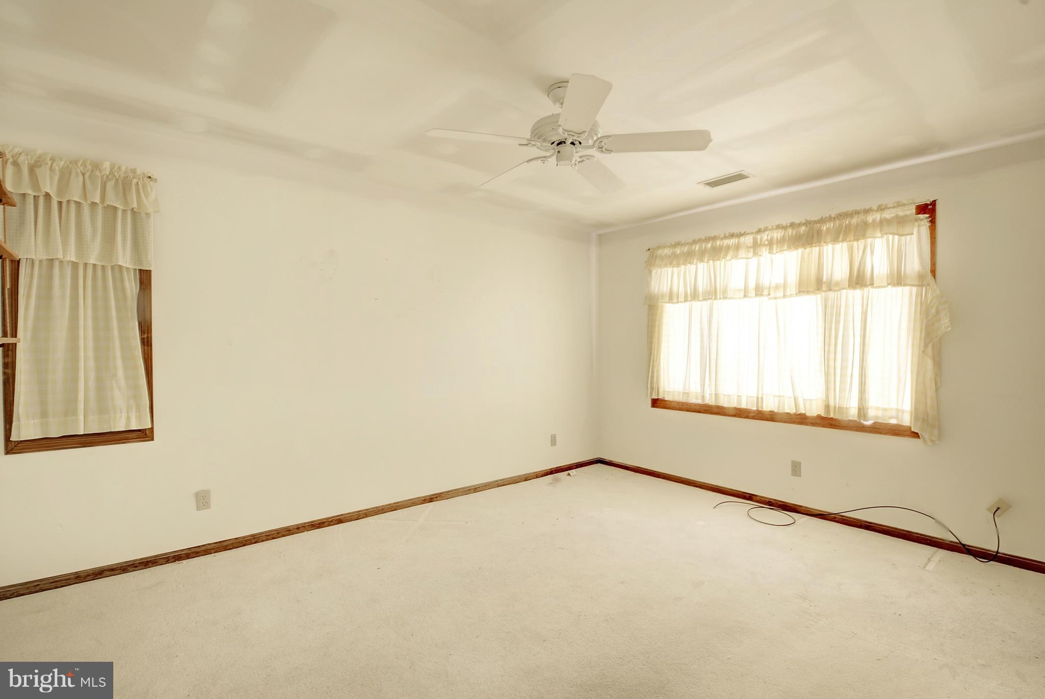 229 Birch Run Road Chestertown, MD 21620 - Photo 21 of 22 an empty room with a window