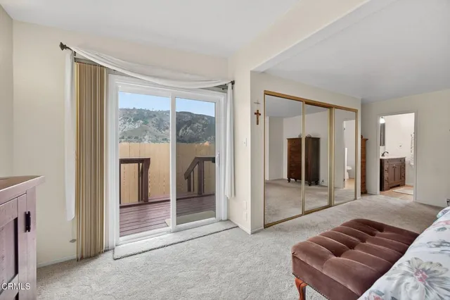 a living room with furniture and a gate