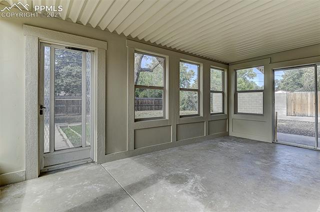 18 North Chelton Road Colorado Springs, CO 80909 - Photo 24 of 32 3 season porch with new windows