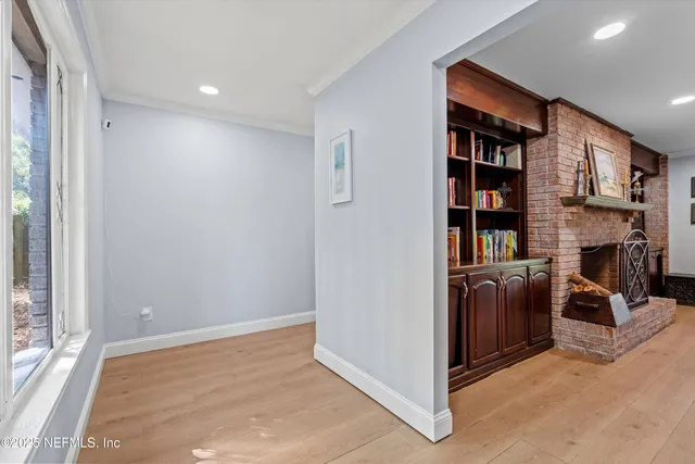 a bathroom with a sink vanity granite and a mirror
