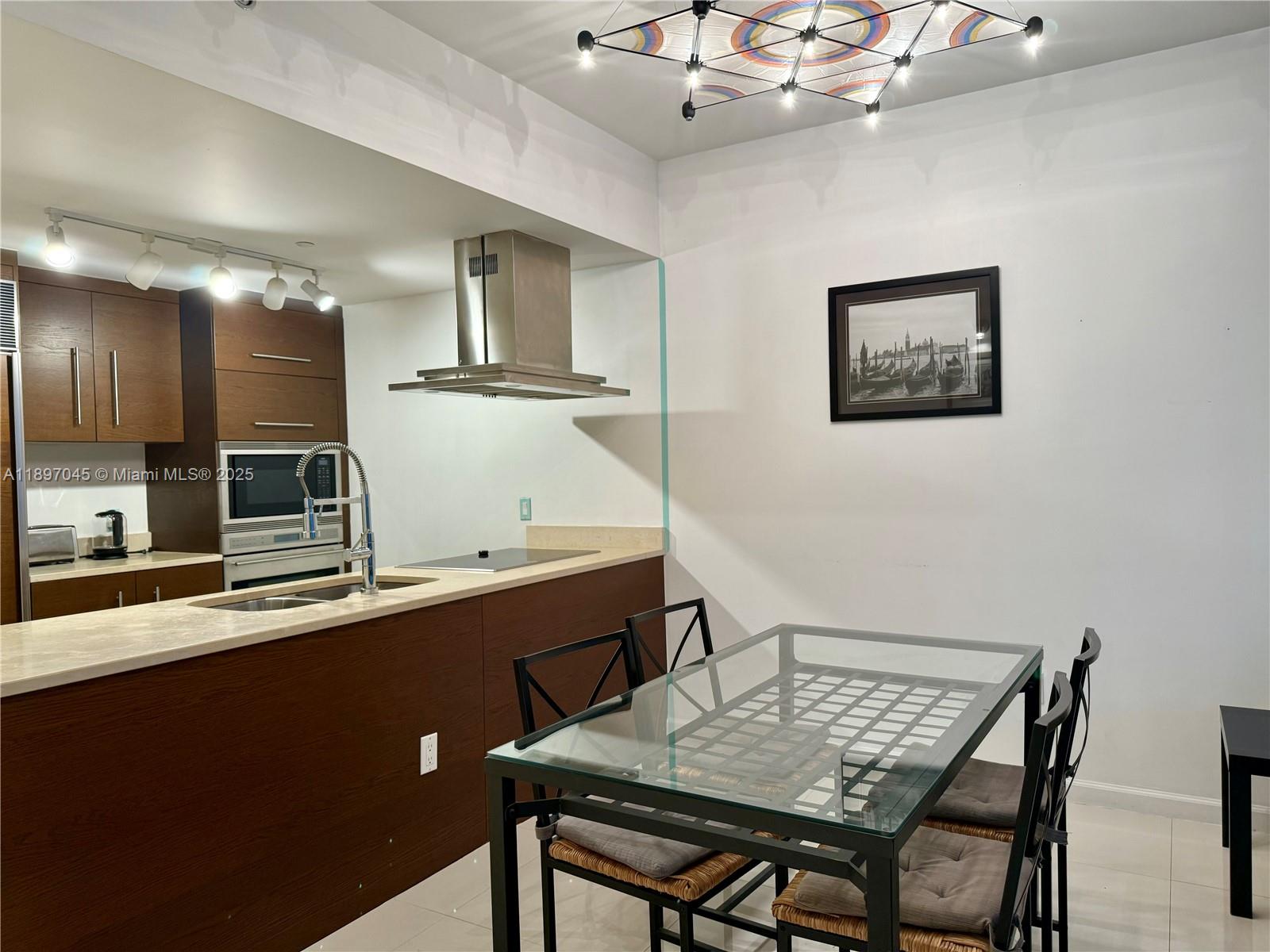 485 Brickell Avenue, Unit 2606 Miami, FL 33131 - Photo 11 of 18 a view of a dining room with furniture