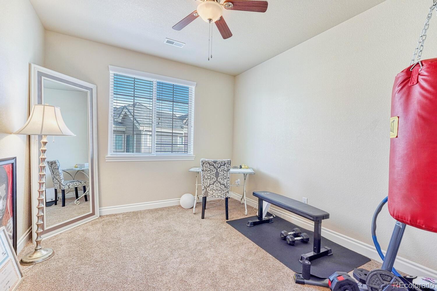 10120 RidgeGate Circle Lone Tree, CO 80124 - Photo 21 of 25 a workspace with furniture and a window