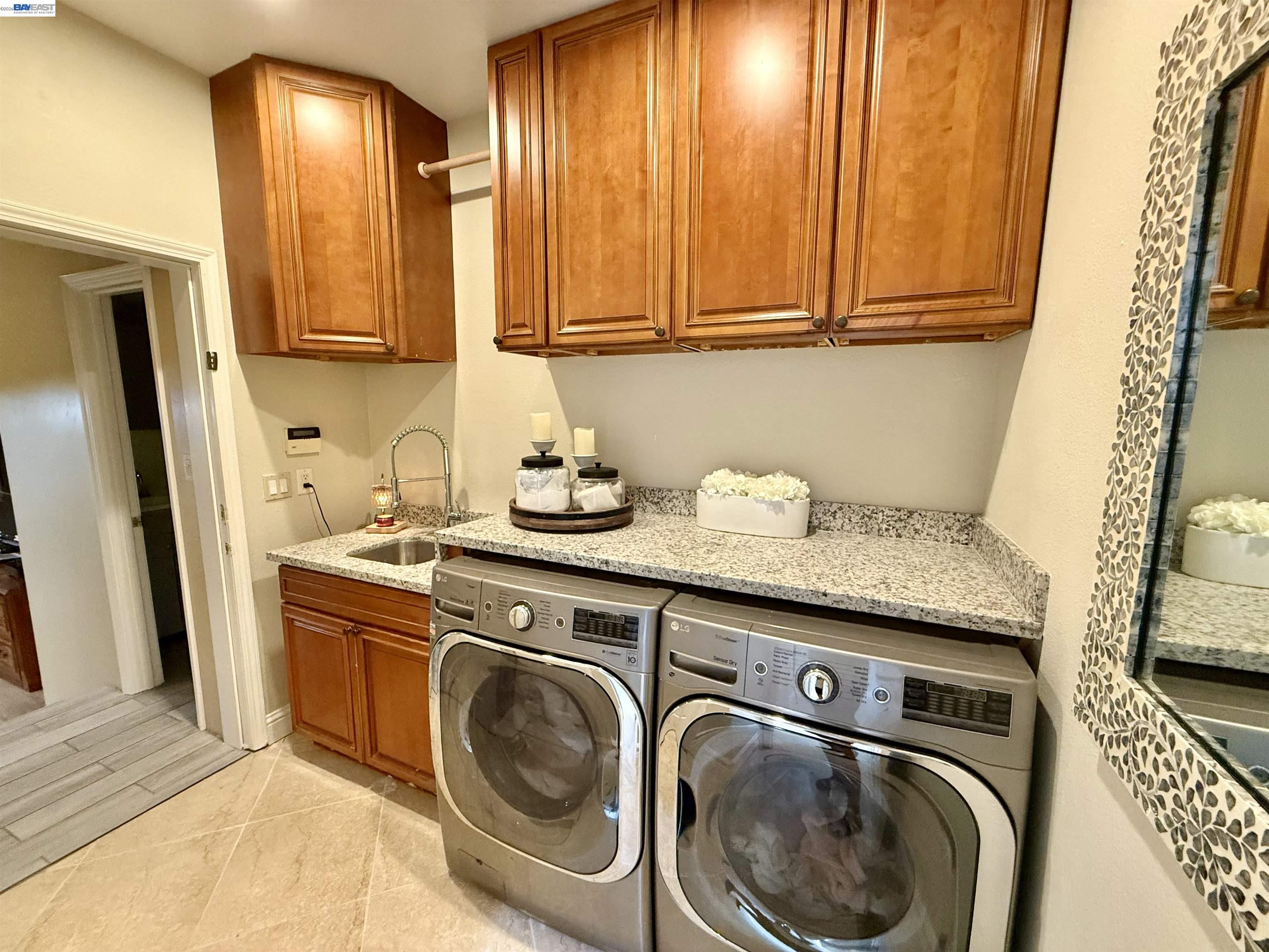 1284 Riesling Circle Livermore, CA 94550 - Photo 34 of 79 a utility room with dryer and washer