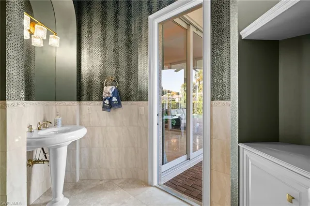 $3,100,000 | 8812 Muirfield Drive, Naples, FL 34109