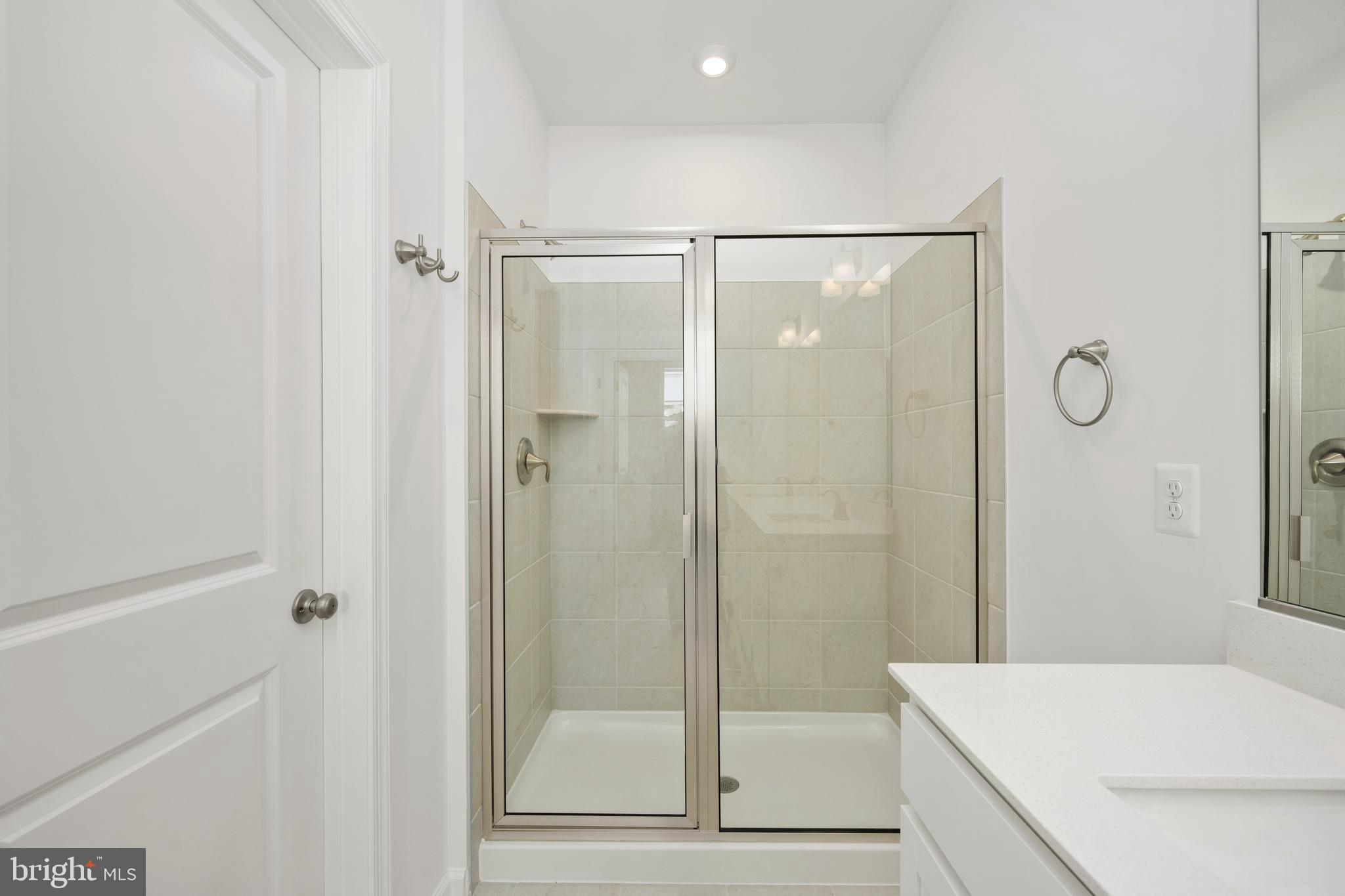 2518 Neabsco Common Place Woodbridge, VA 22191 - Photo 29 of 37 a bathroom with a shower and a sink