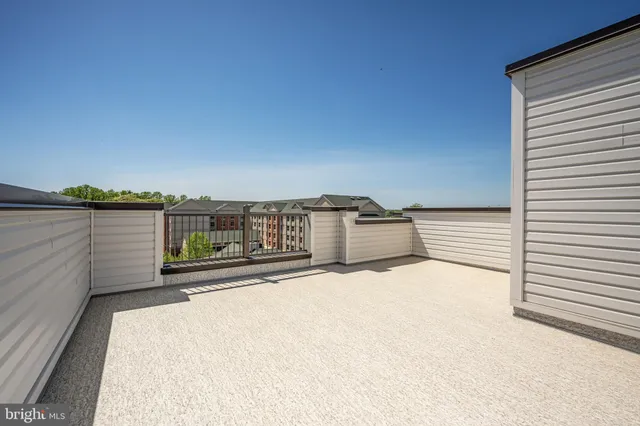 a bathroom with a double vanity sink mirror and bathtub