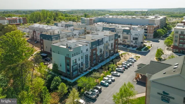 a view of a house with a snow in the yard