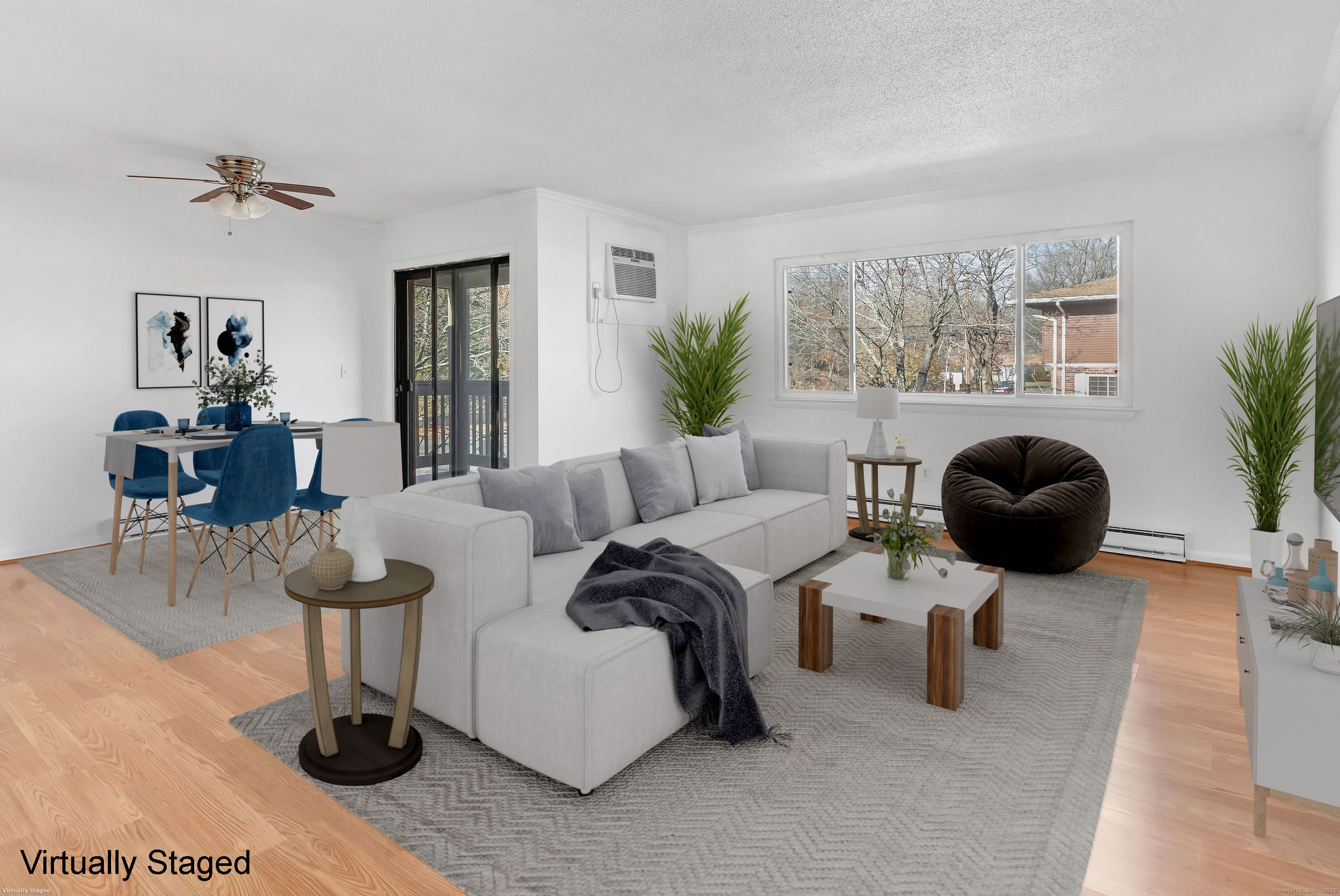 3012 Madison Avenue, Unit F Bridgeport, CT 06606 - Photo 12 of 18 a living room with fireplace furniture and a large window