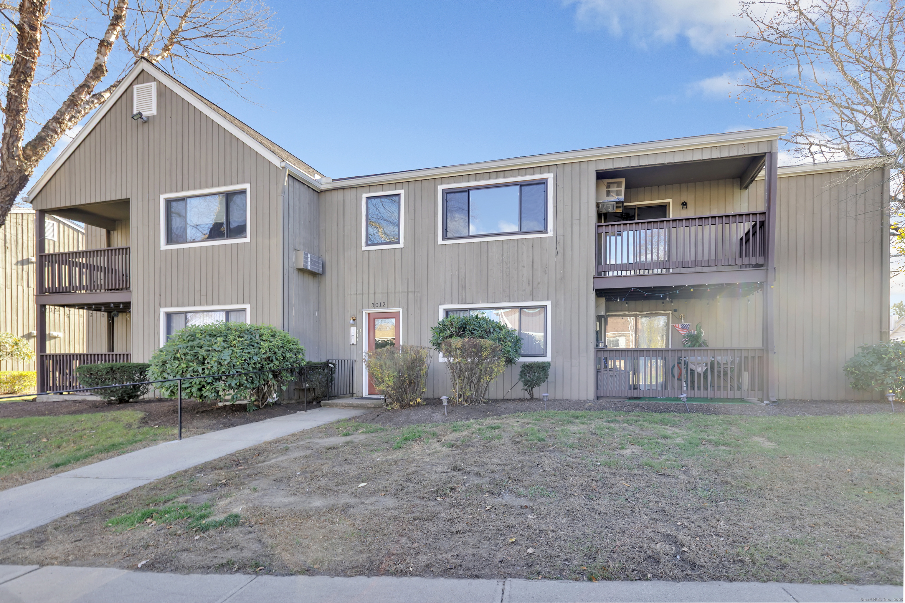 3012 Madison Avenue, Unit F Bridgeport, CT 06606 - Photo 4 of 18 a front view of a house with garden