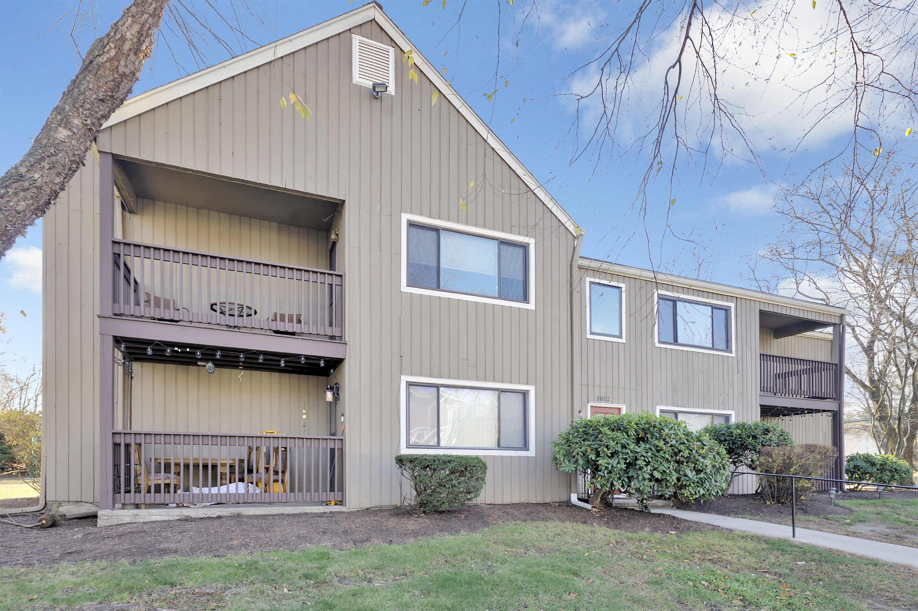 3012 Madison Avenue, Unit F Bridgeport, CT 06606 - Photo 6 of 18 a front view of a house with garden