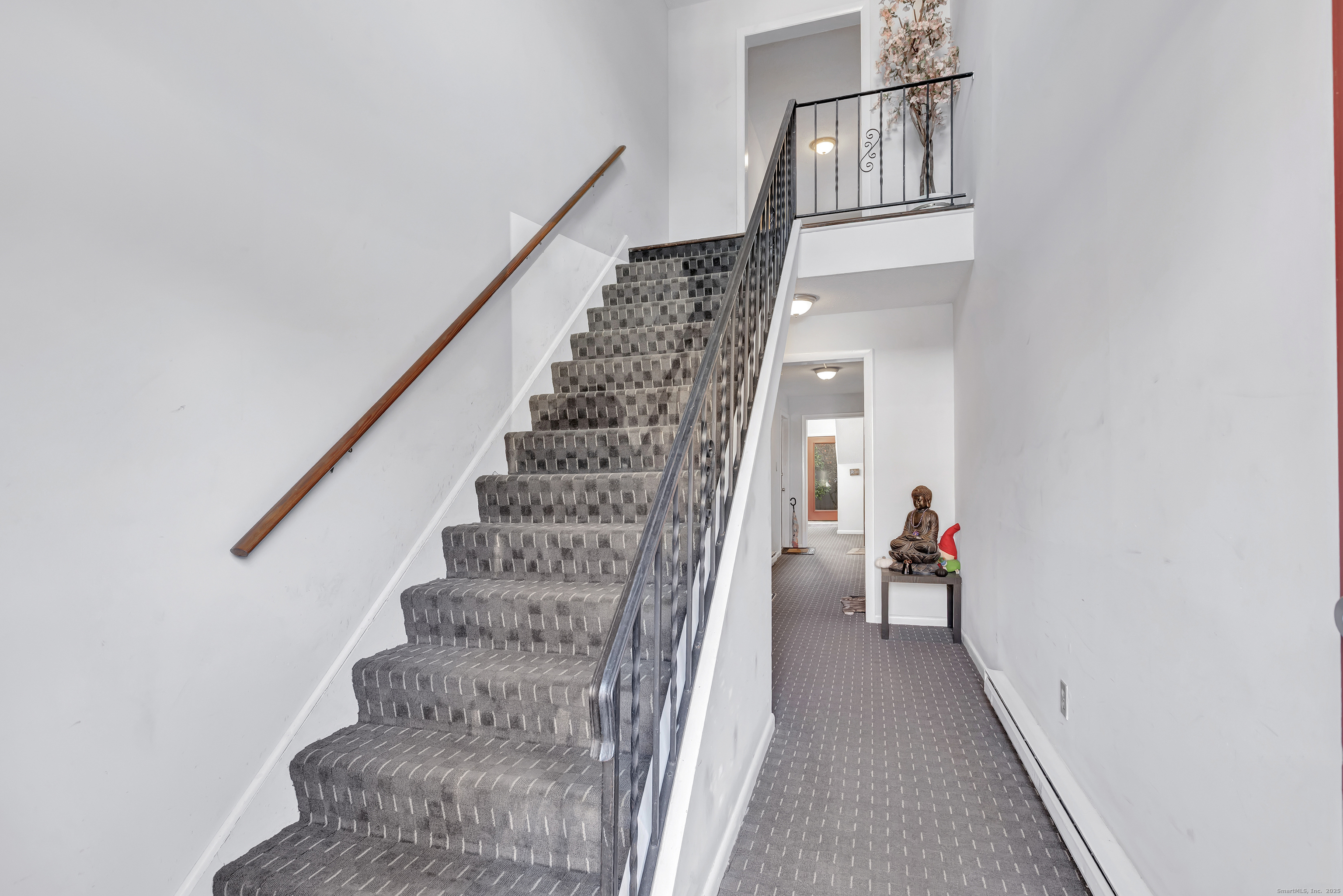 3012 Madison Avenue, Unit F Bridgeport, CT 06606 - Photo 9 of 18 a view of entryway and hall with wooden floor