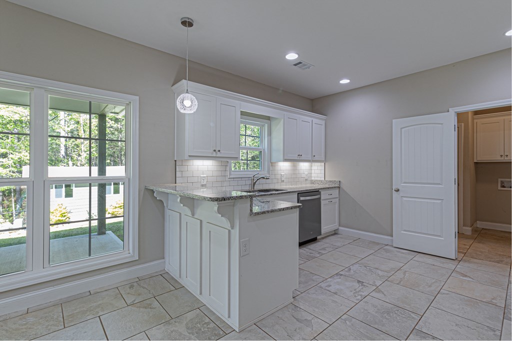 468 Valley Rescue Mission Road Hamilton, GA 31811 - Photo 8 of 29 Beautiful Granite counters and subway backsplash