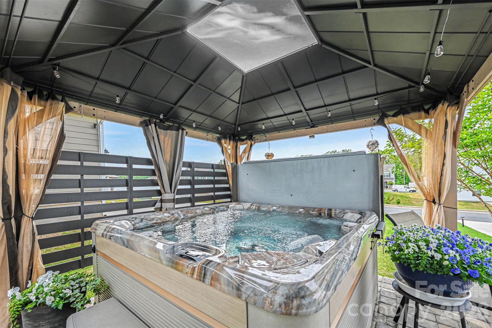425 Kiser Lane Locust, NC 28097 - Photo 24 of 25 a view of a backyard with sitting area