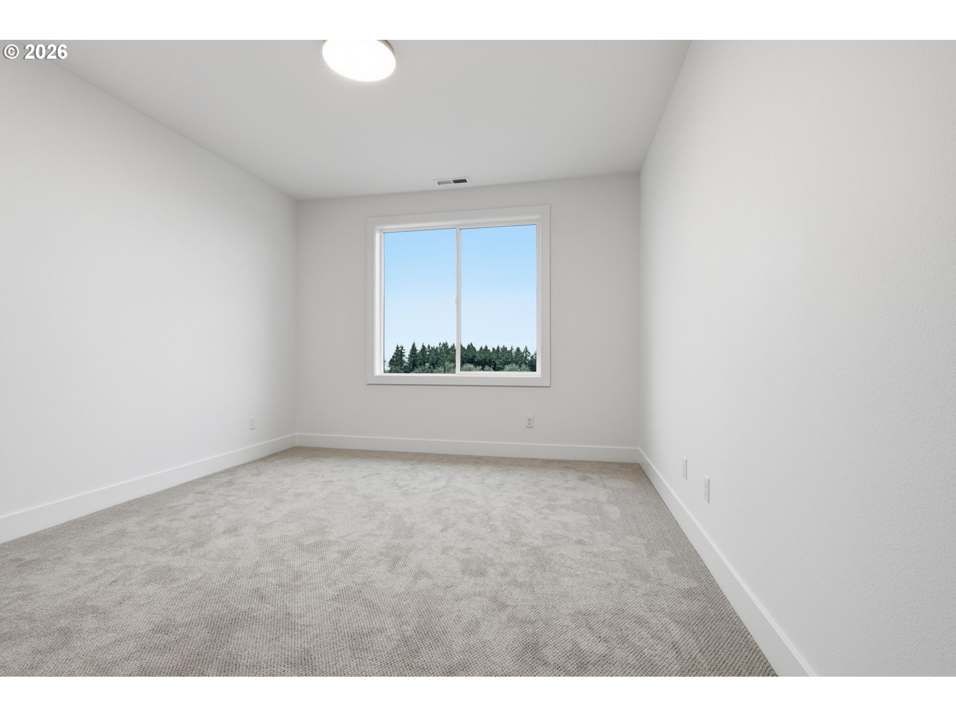 23037 Southwest Curry Rdg Drive Sherwood, OR 97140 - Photo 27 of 48 a view of an empty room with a window