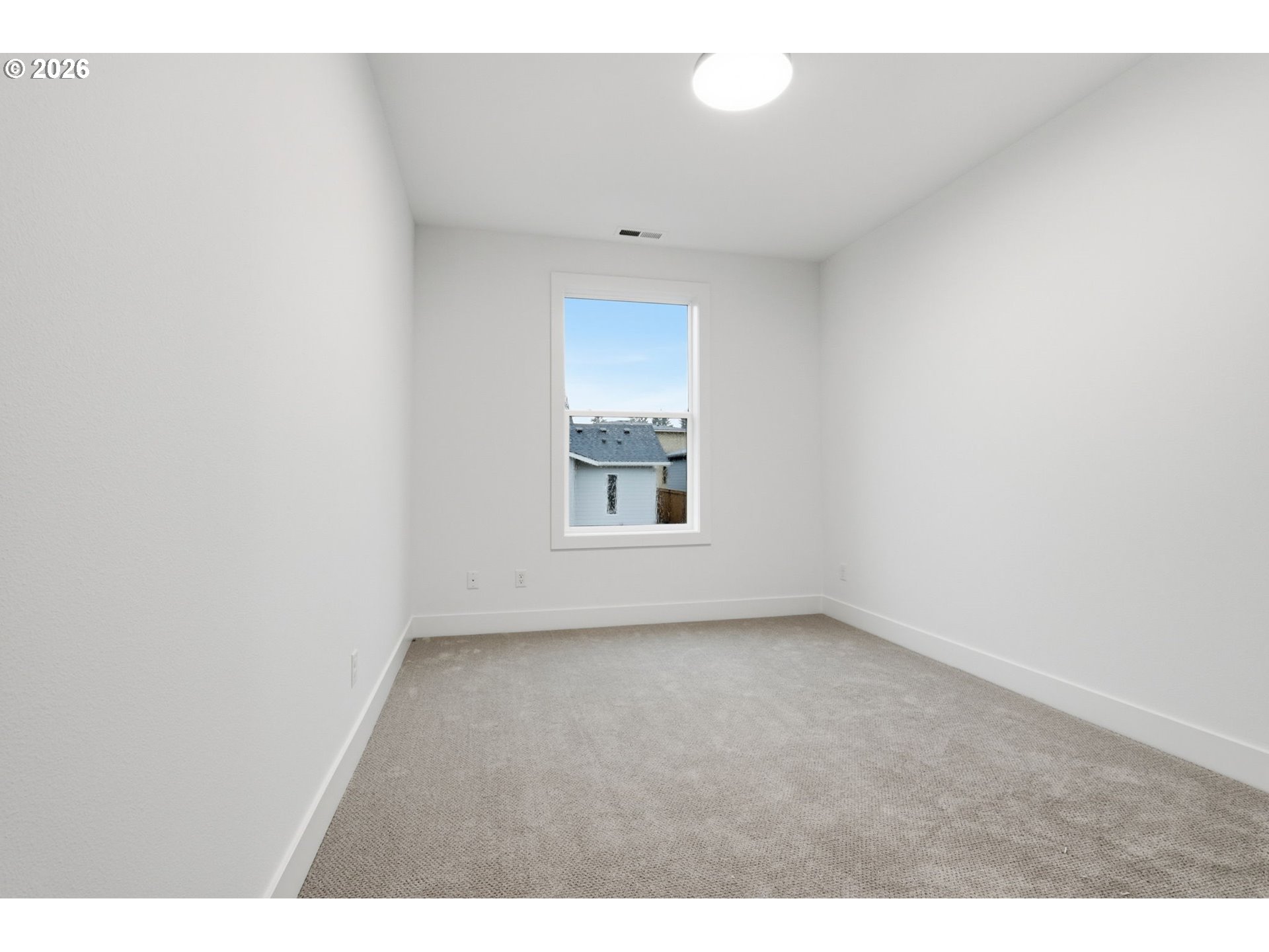 23037 Southwest Curry Rdg Drive Sherwood, OR 97140 - Photo 32 of 48 a view of an empty room with a window