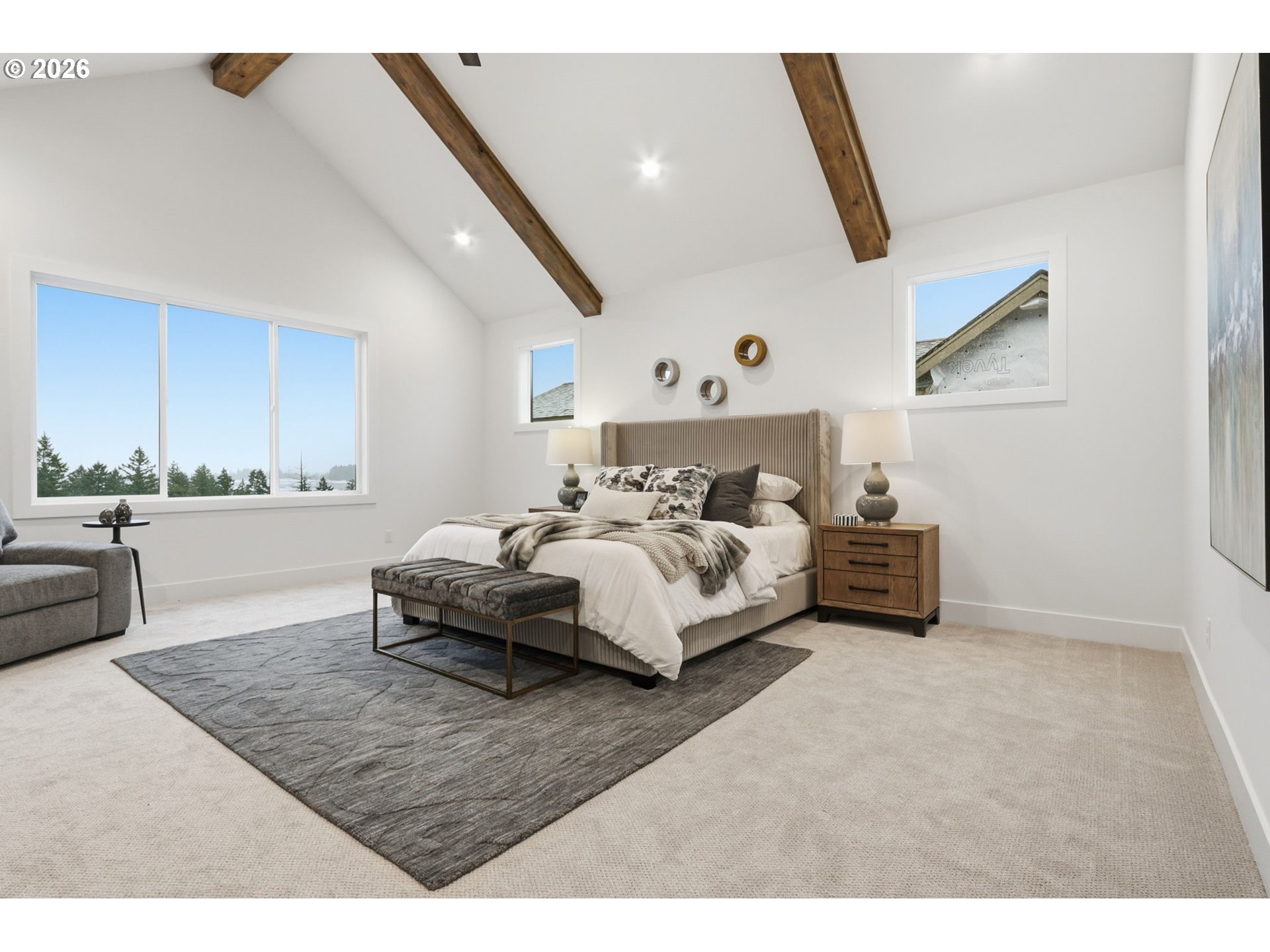 23037 Southwest Curry Rdg Drive Sherwood, OR 97140 - Photo 35 of 48 a spacious bedroom with a bed and a couch