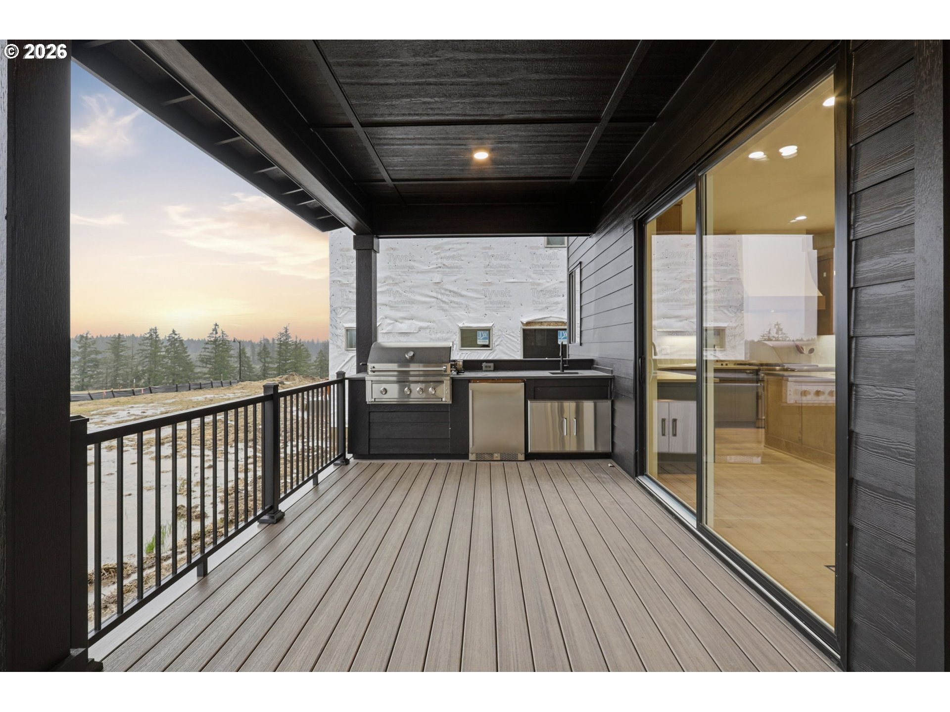 23037 Southwest Curry Rdg Drive Sherwood, OR 97140 - Photo 42 of 48 a view of a wooden balcony with a sink