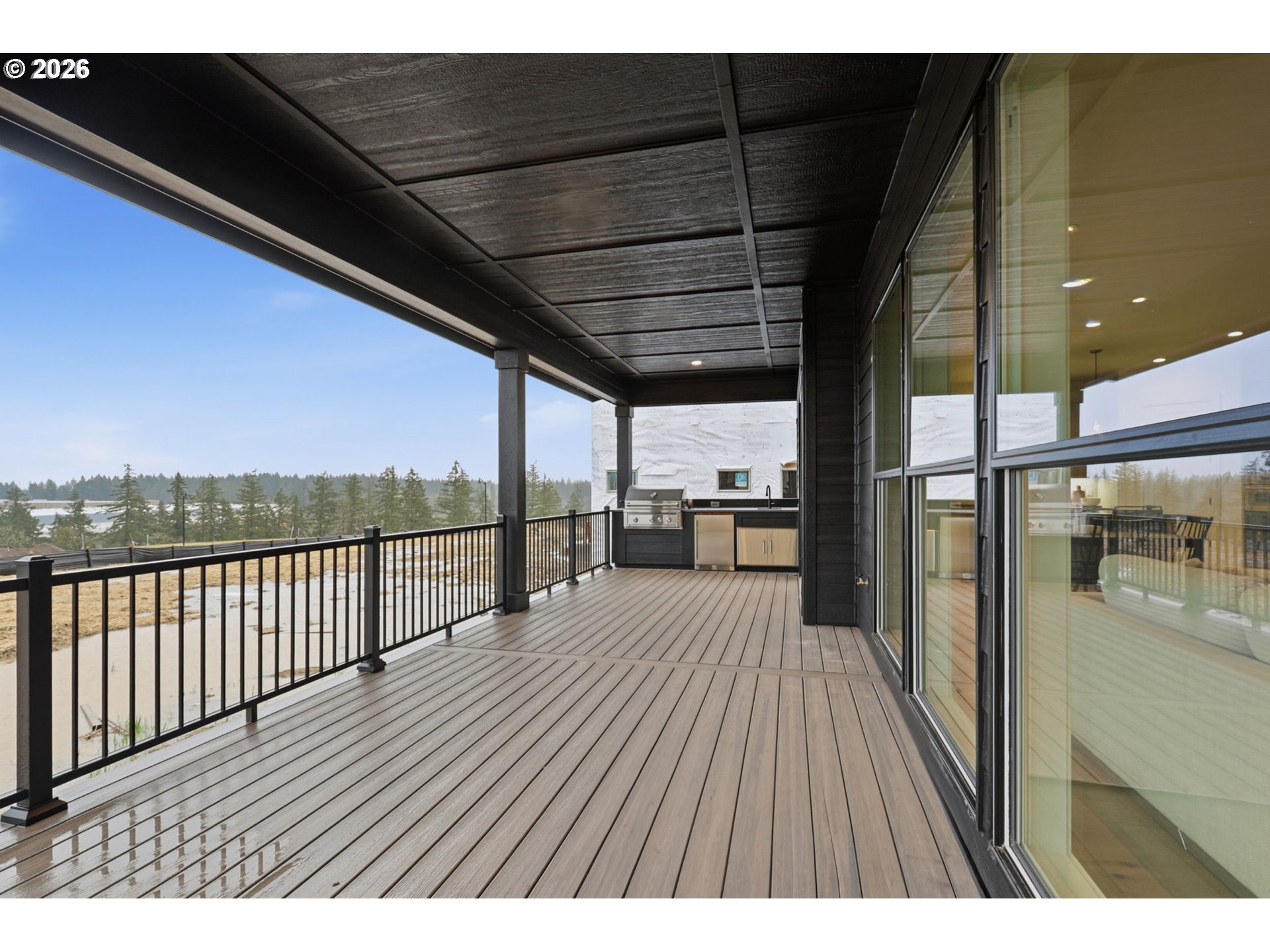 23037 Southwest Curry Rdg Drive Sherwood, OR 97140 - Photo 43 of 48 a view of balcony with wooden floor
