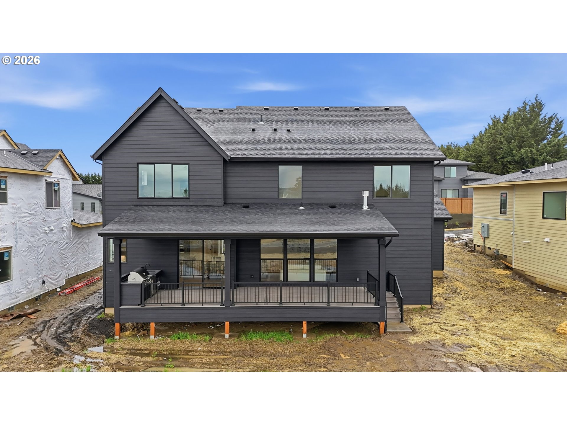 23037 Southwest Curry Rdg Drive Sherwood, OR 97140 - Photo 45 of 48 a front view of a house with a yard